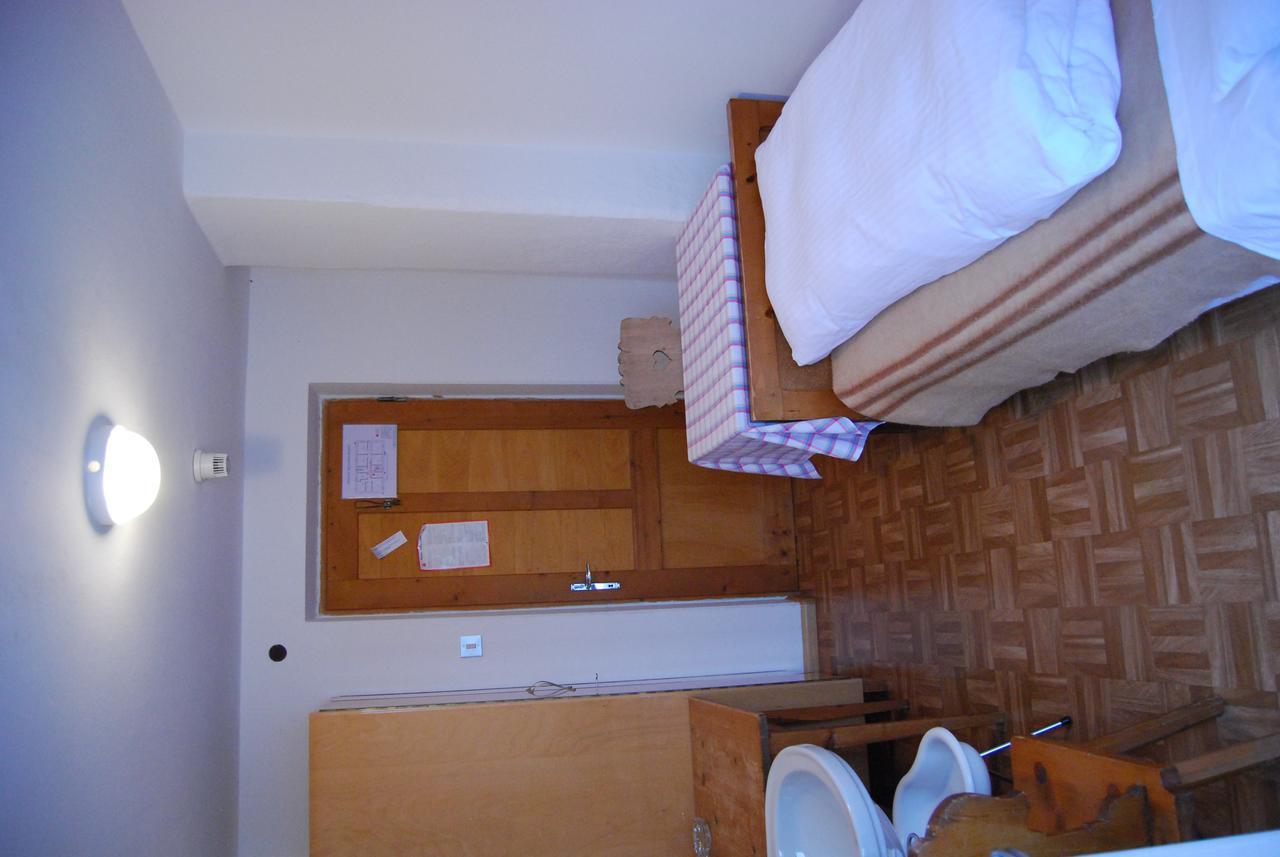 ホテルRifugio Gardeccia Hutte ポッツァ・ディ・ファッサ 部屋 写真